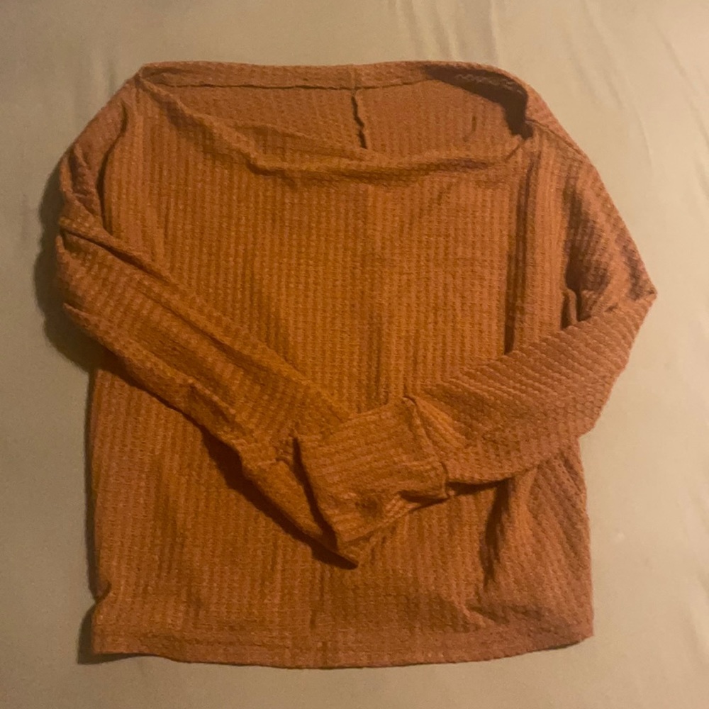 red-orange sweater